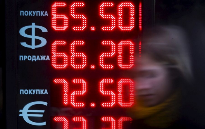 Мартовское ослабление рубля: когда доллар снова будет стоить 65? 
